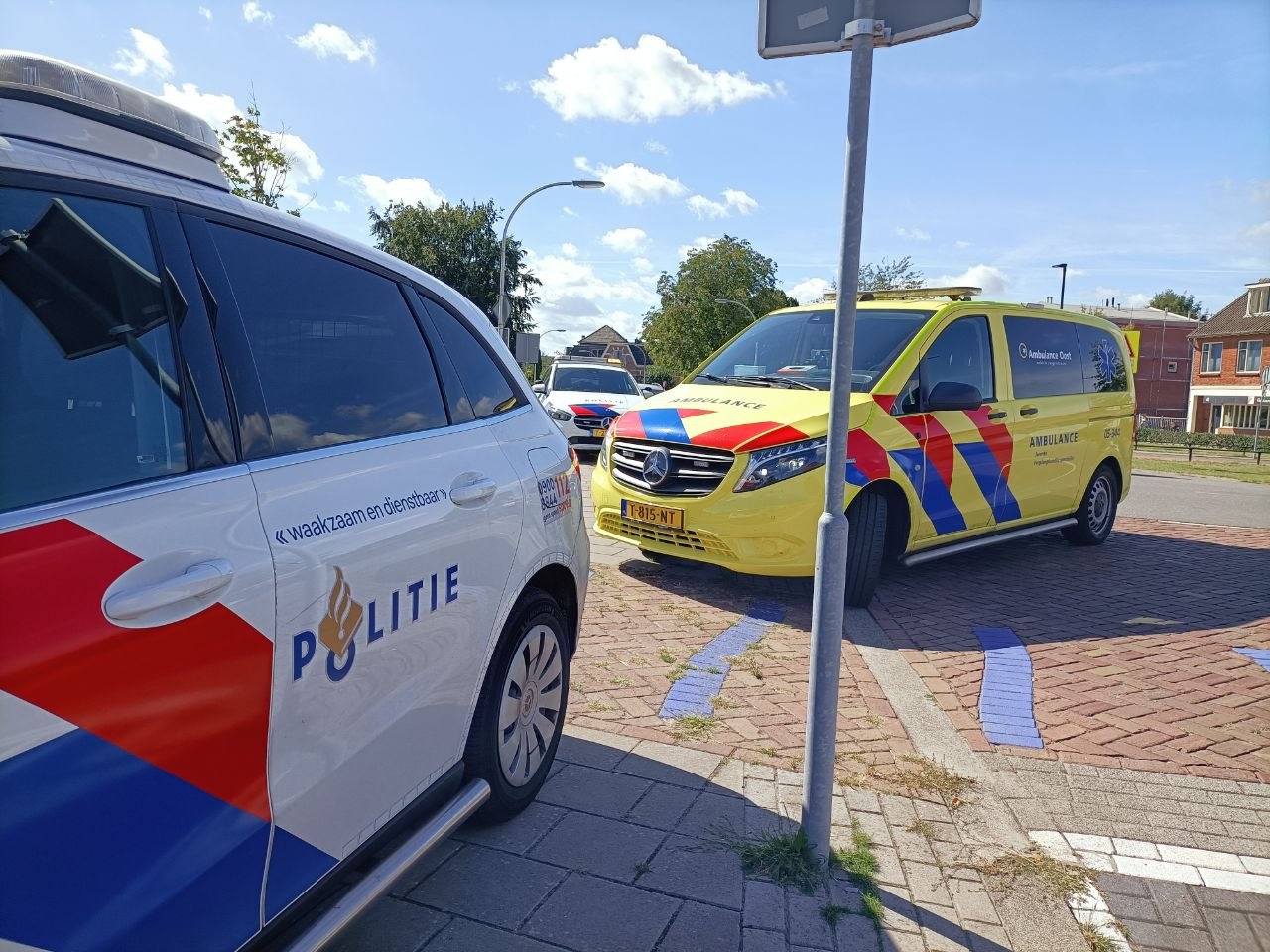 Twee fietsers botsen op elkaar - foto