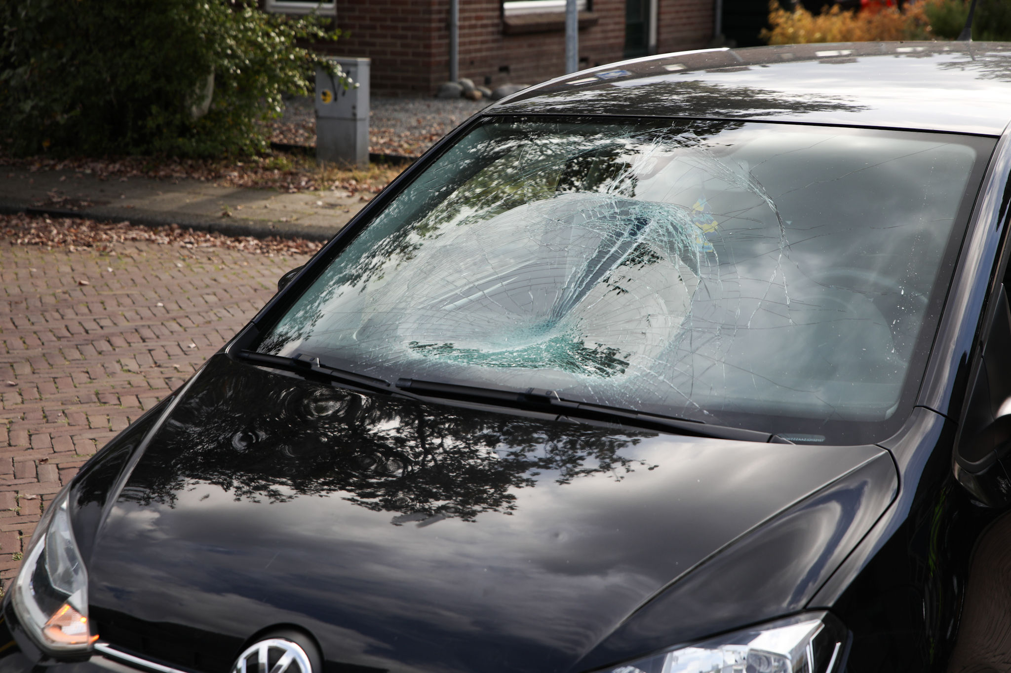 Aanrijding tussen auto en fietser - foto